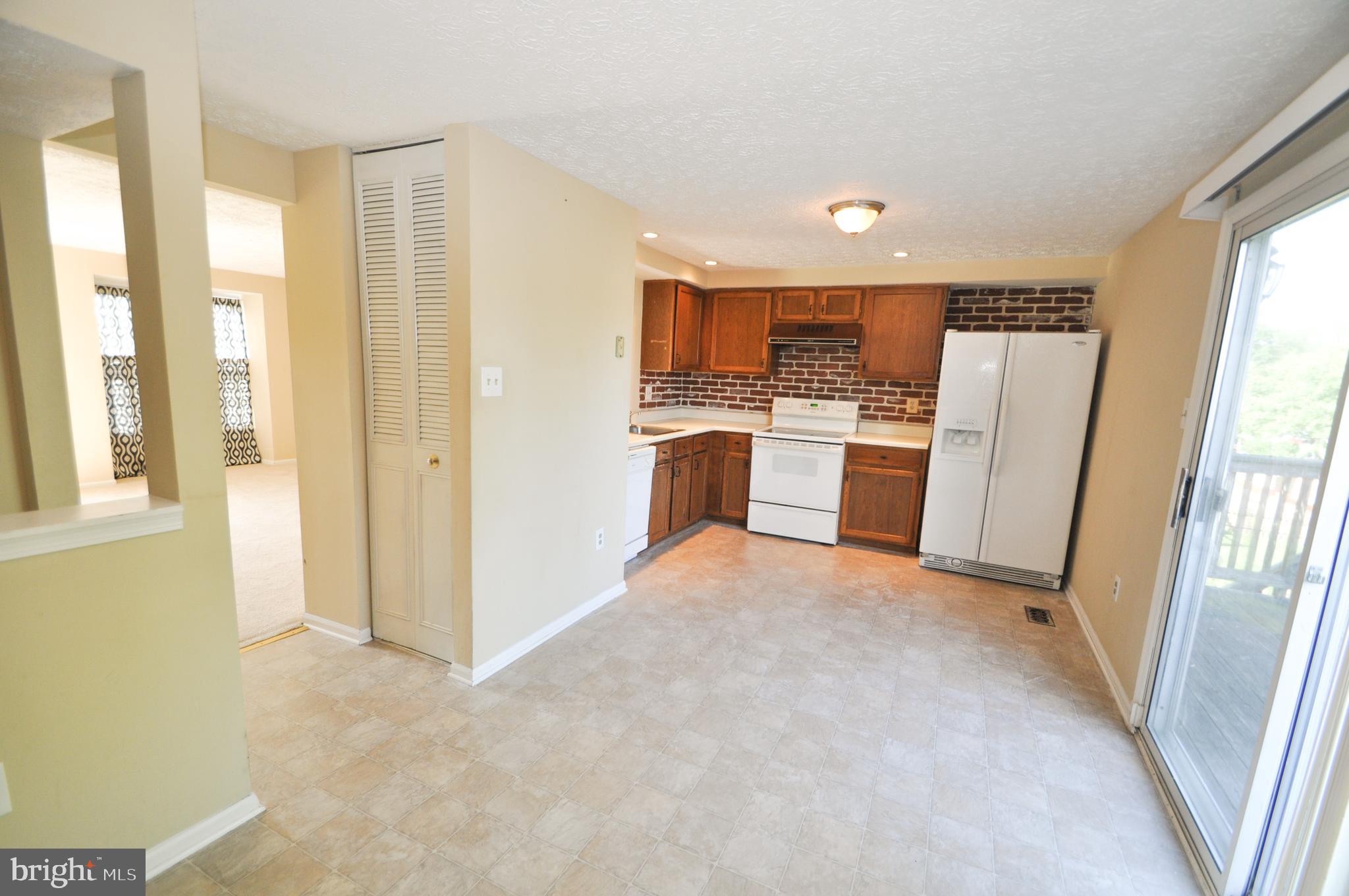 17 Greenleaf Road Baltimore, MD 21234 - Photo 9 of 28 Slider to the rear deck from the kitchen