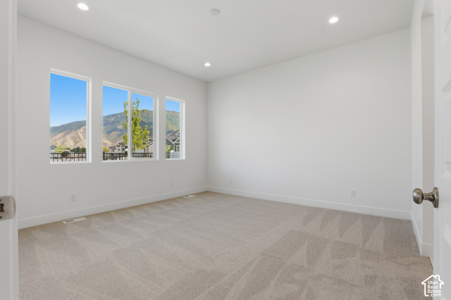 538 North Legend Circle, Unit 505 Mapleton, UT 84664 - Photo 32 of 48 Recessed lighting illuminates neutral carpeting and white walls