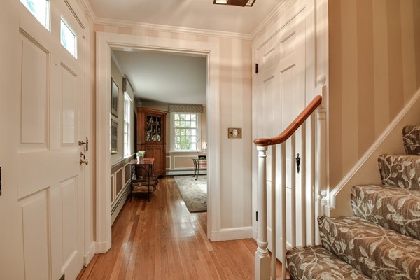 21 Fox Hill Road Wellesley, MA 02481 - Photo 18 of 30 a view of a hallway with wooden floor and staircase