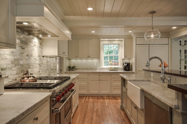 21 Fox Hill Road Wellesley, MA 02481 - Photo 5 of 30 a kitchen with a sink stove and cabinets