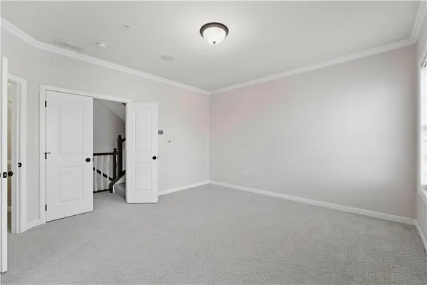 a bathroom with a bathtub sink and mirror