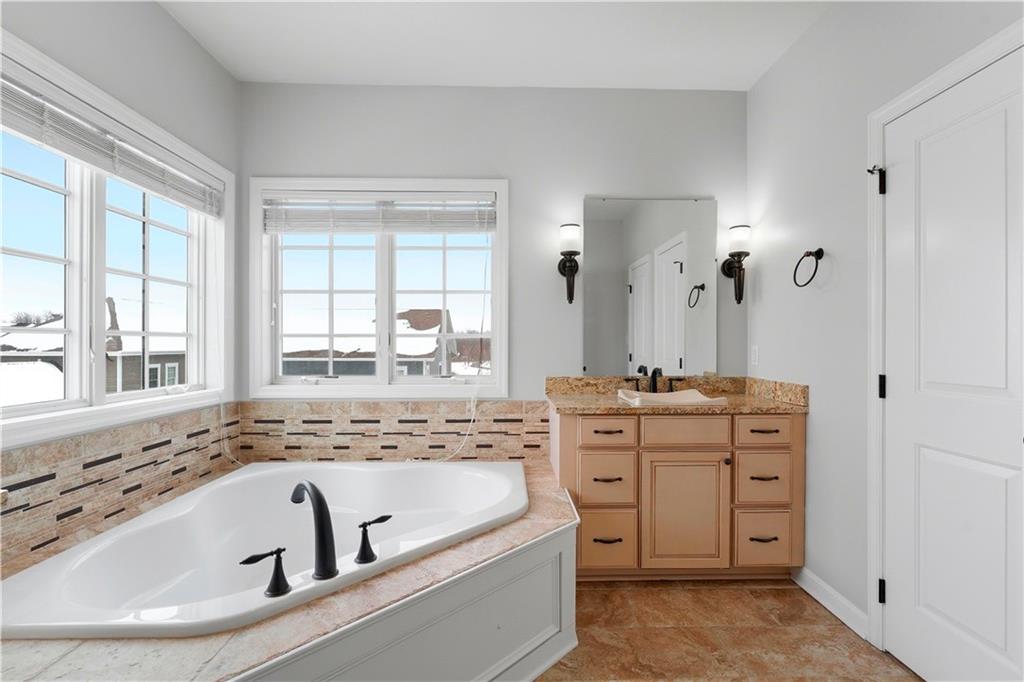 200 Venango Trail Mars, PA 16046 - Photo 26 of 49 a bathroom with a granite countertop tub sink and mirror