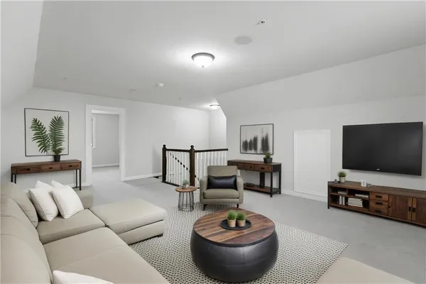 a bedroom with a bed and chair