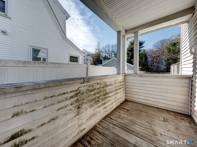 a view of a backyard of the house