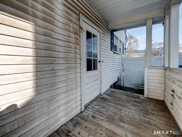 a view of a backyard with large trees