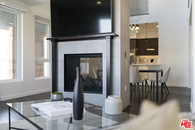 a view of a livingroom with furniture and windows