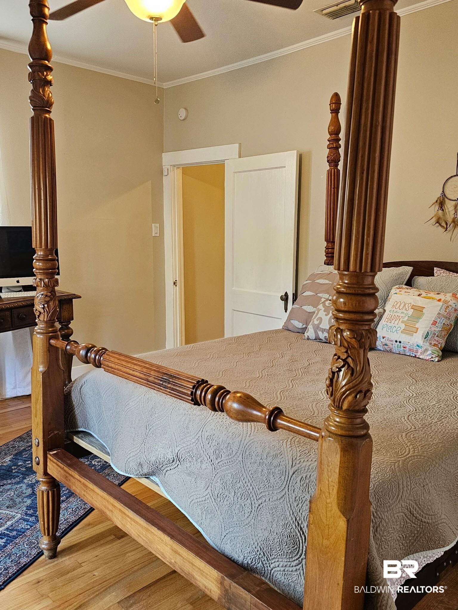 1215 Church Street Mobile, AL 36604 - Photo 18 of 23 Bedroom featuring ceiling fan, ornamental molding, and wood finished floors