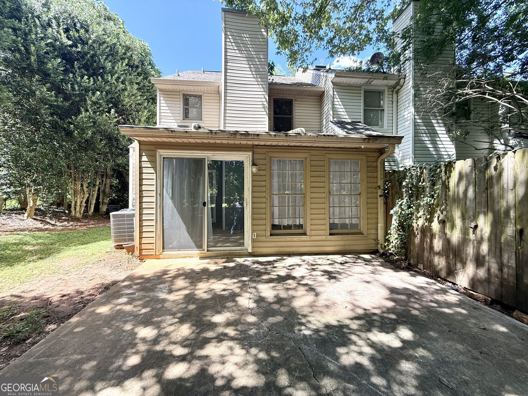 2949 Governors Court Marietta, GA 30066 - Photo 11 of 17 a front view of a house with a garden