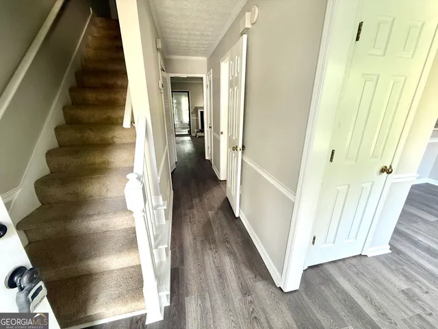 a view of entryway with wooden floor