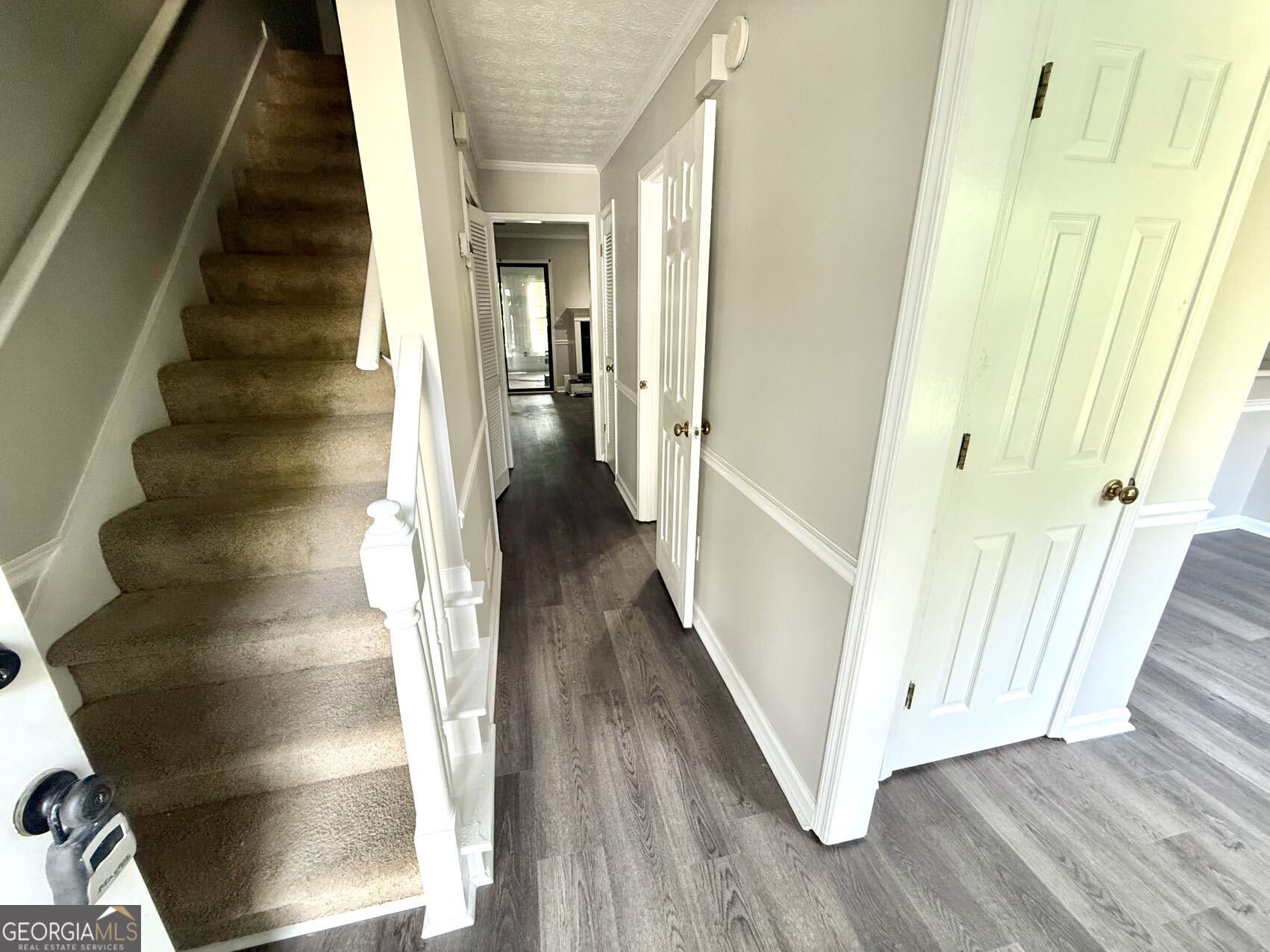 2949 Governors Court Marietta, GA 30066 - Photo 7 of 17 a view of entryway with wooden floor