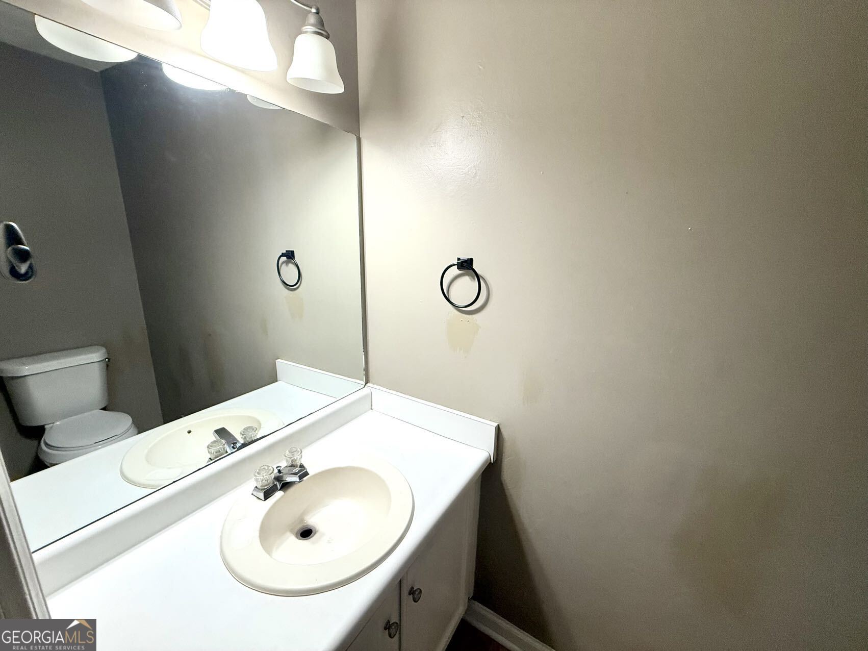 2949 Governors Court Marietta, GA 30066 - Photo 8 of 17 a bathroom with a sink and a mirror