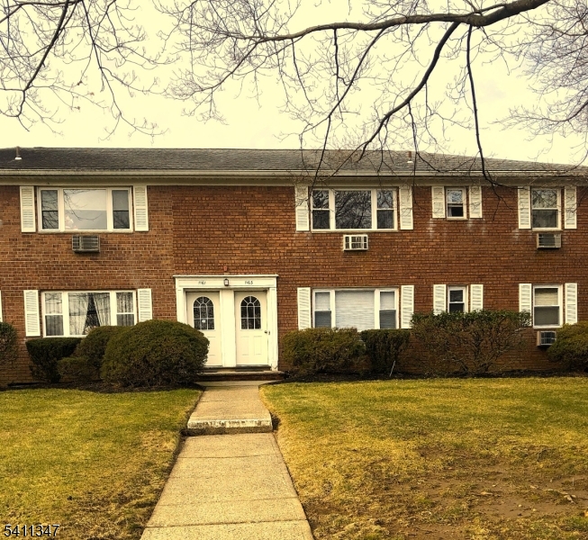 a front view of a house having yard