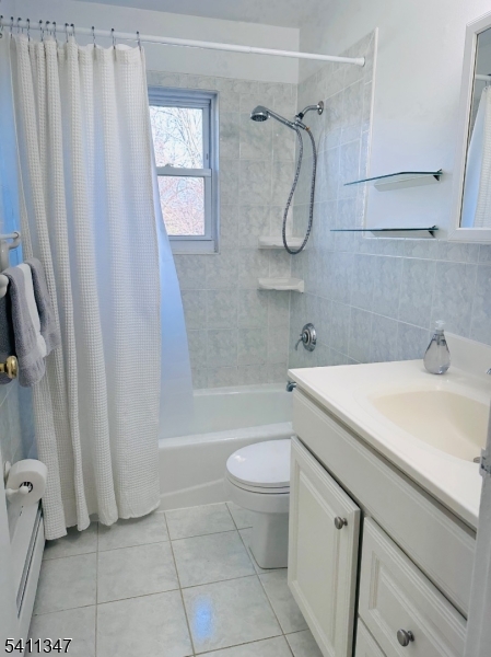 1163 Valley Road, Unit B Wayne, NJ 07470 - Photo 14 of 23 a bathroom with a granite countertop sink toilet and shower
