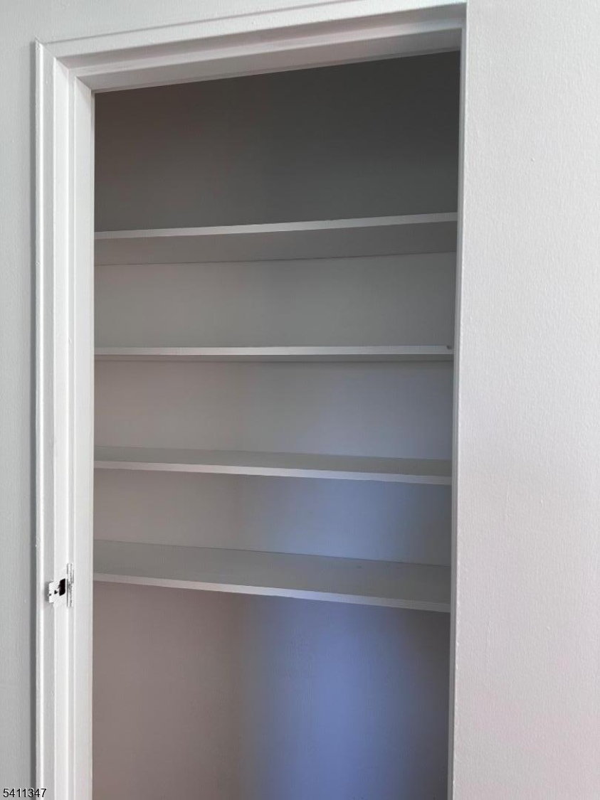 1163 Valley Road, Unit B Wayne, NJ 07470 - Photo 15 of 23 a view of walk in closet with empty racks