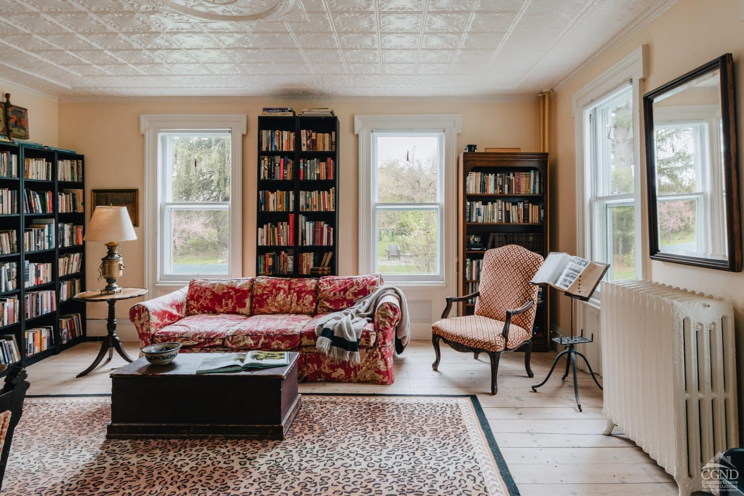 110 Stickle Road Hudson, NY 12534 - Photo 11 of 58 a living room with furniture and a book shelf