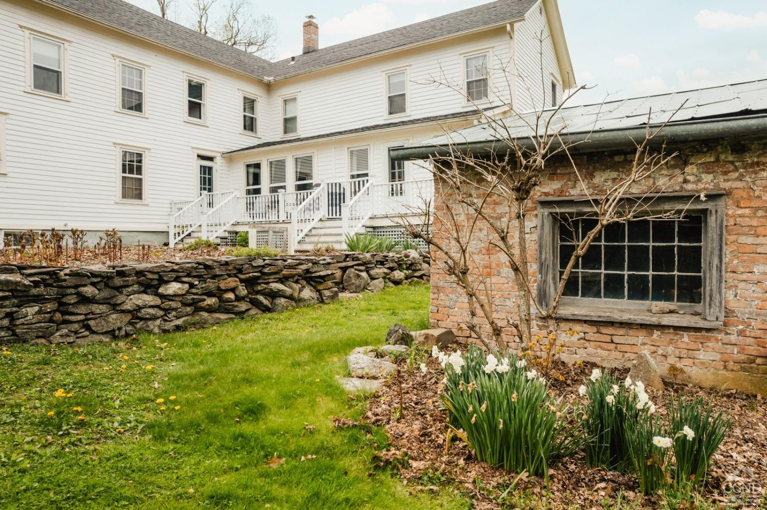 110 Stickle Road Hudson, NY 12534 - Photo 41 of 58 a front view of a house with a garden