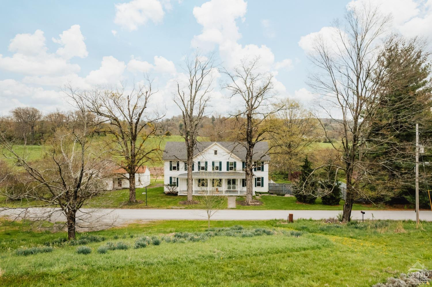 110 Stickle Road Hudson, NY 12534 - Photo 51 of 58 a large white building with a big yard and large trees