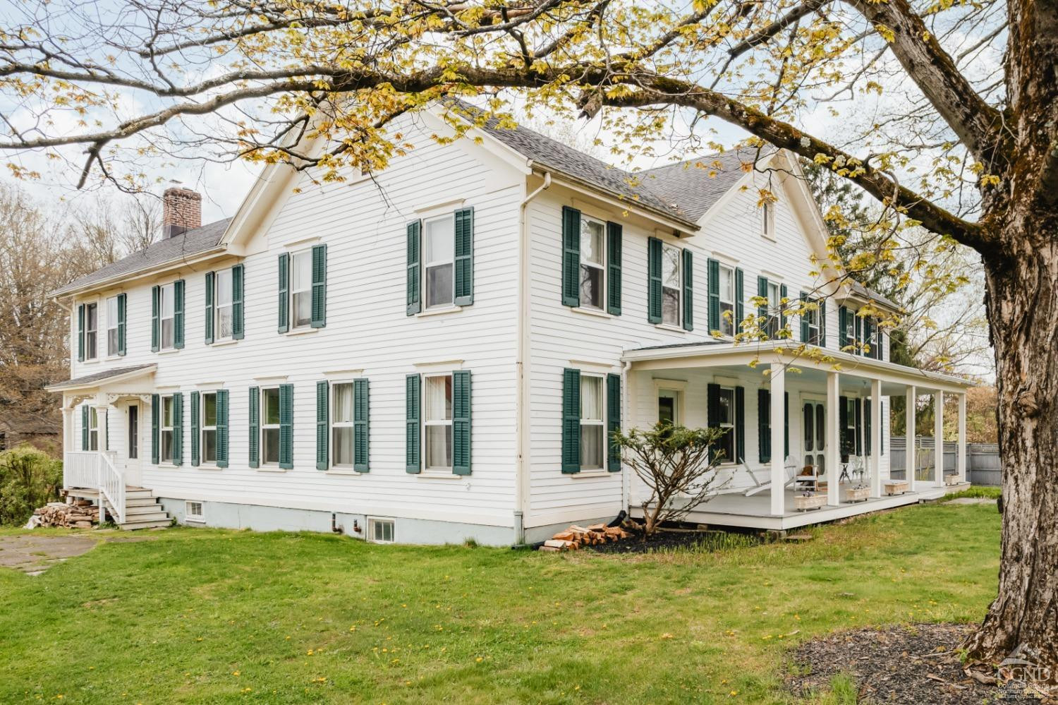 110 Stickle Road Hudson, NY 12534 - Photo 6 of 58 a front view of a house with a garden and swimming pool