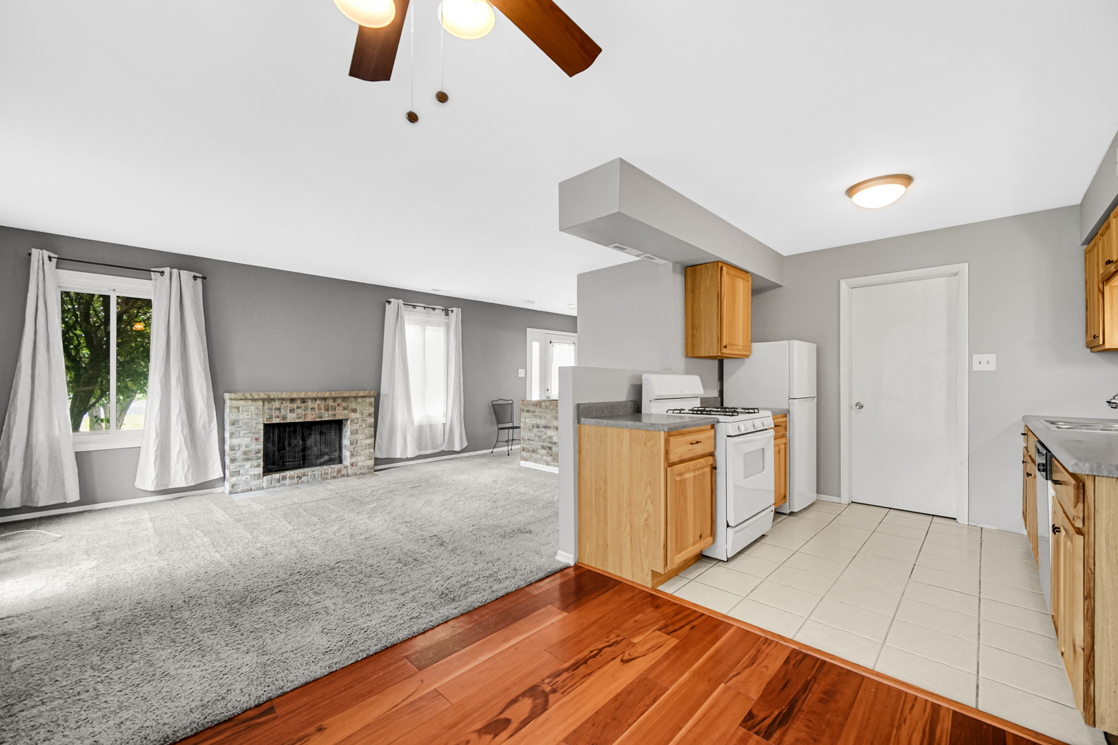 51 Churn Road Matteson, IL 60443 - Photo 14 of 20 a view of a kitchen with microwave and stove top oven
