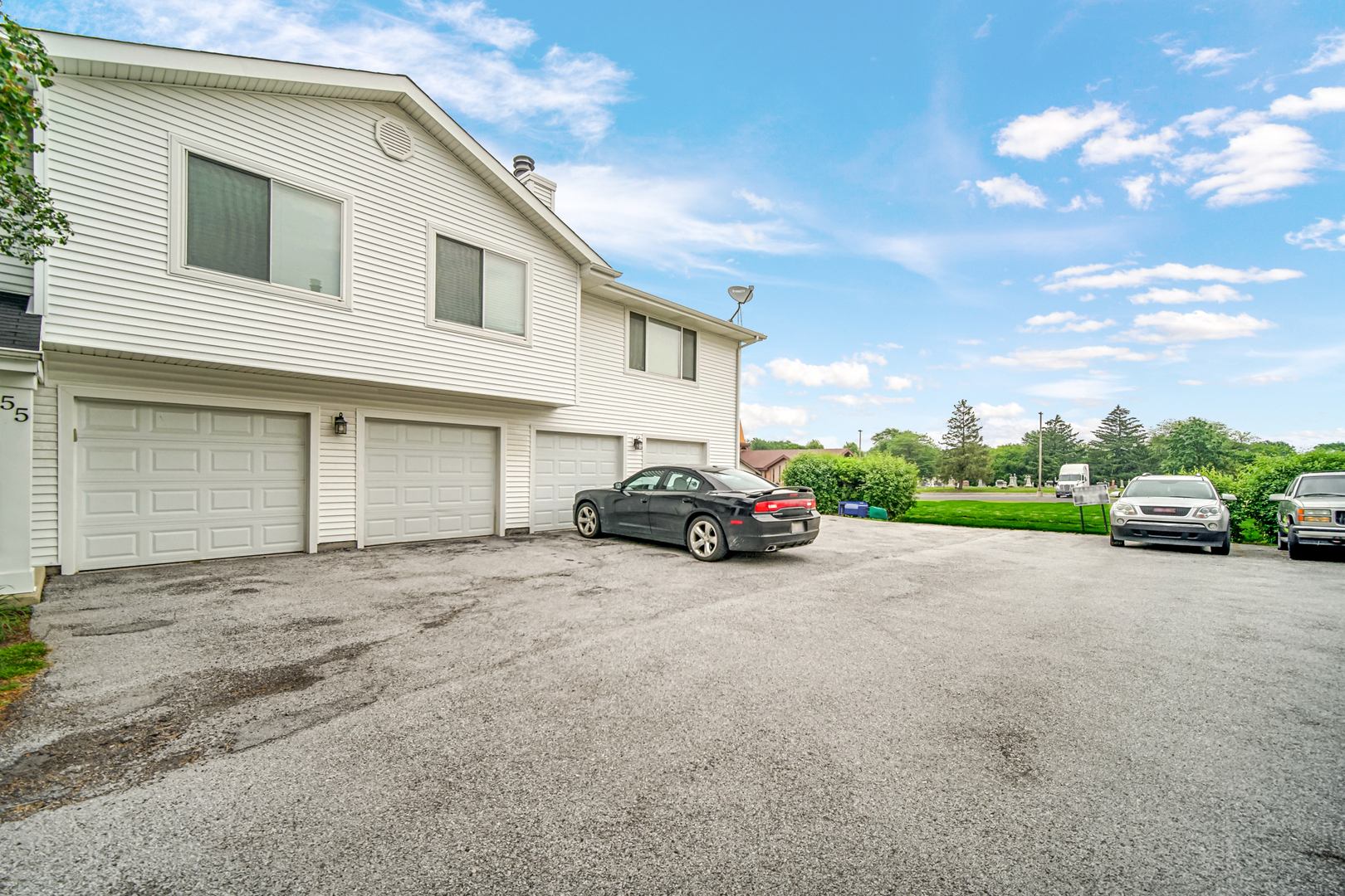 51 Churn Road Matteson, IL 60443 - Photo 20 of 20 a view of a house with a parking space and a car parked in front of it