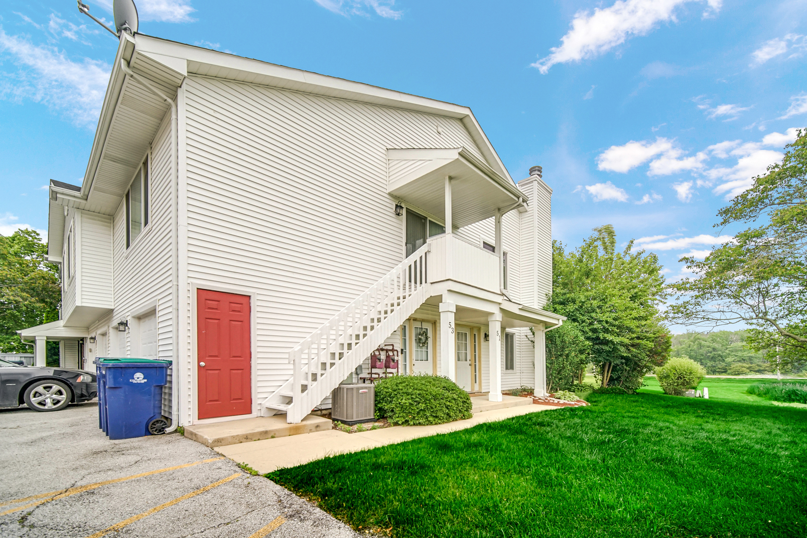 51 Churn Road Matteson, IL 60443 - Photo 3 of 20 a front view of a house with a yard