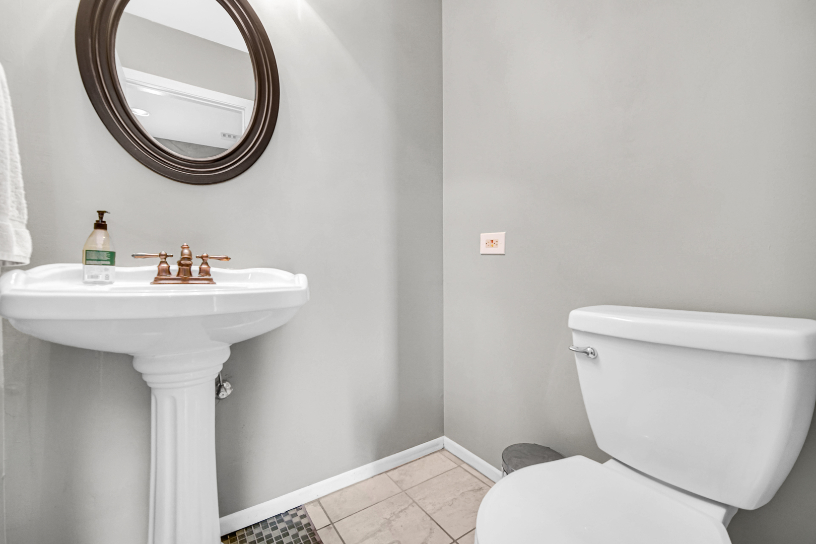 51 Churn Road Matteson, IL 60443 - Photo 9 of 20 a bathroom with a toilet sink and a mirror