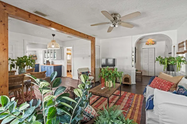 a view of a living room and dining room