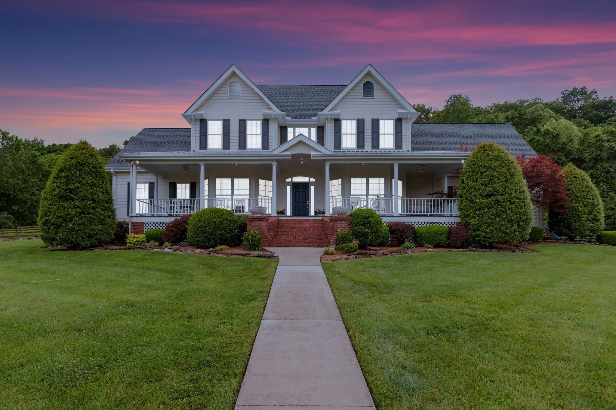 1036 Reed Hollow Road Readyville, TN 37149 - Photo 16 of 90 a front view of a house with a garden