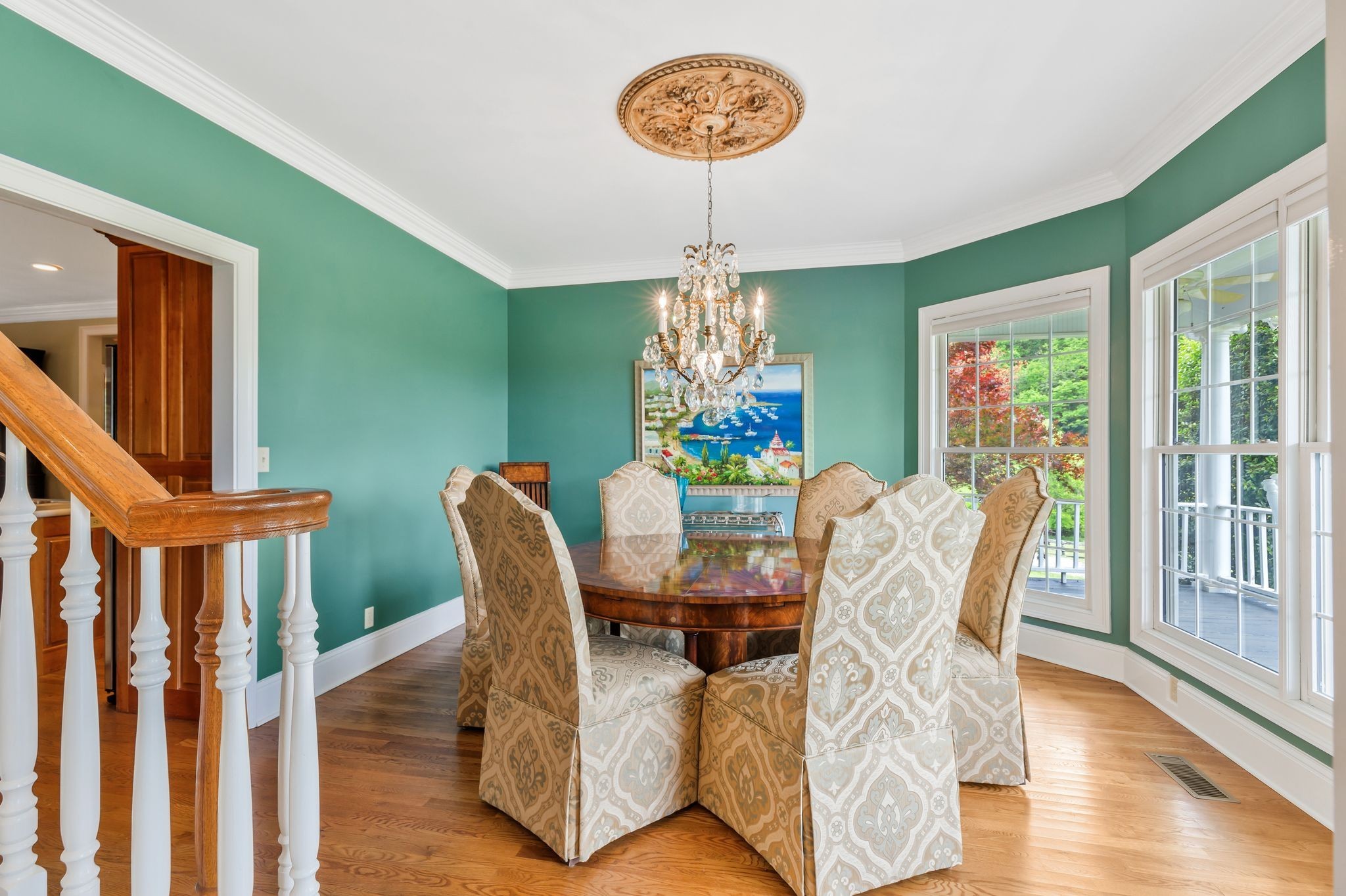 1036 Reed Hollow Road Readyville, TN 37149 - Photo 37 of 90 a view of a dining room with furniture a chandelier and wooden floor