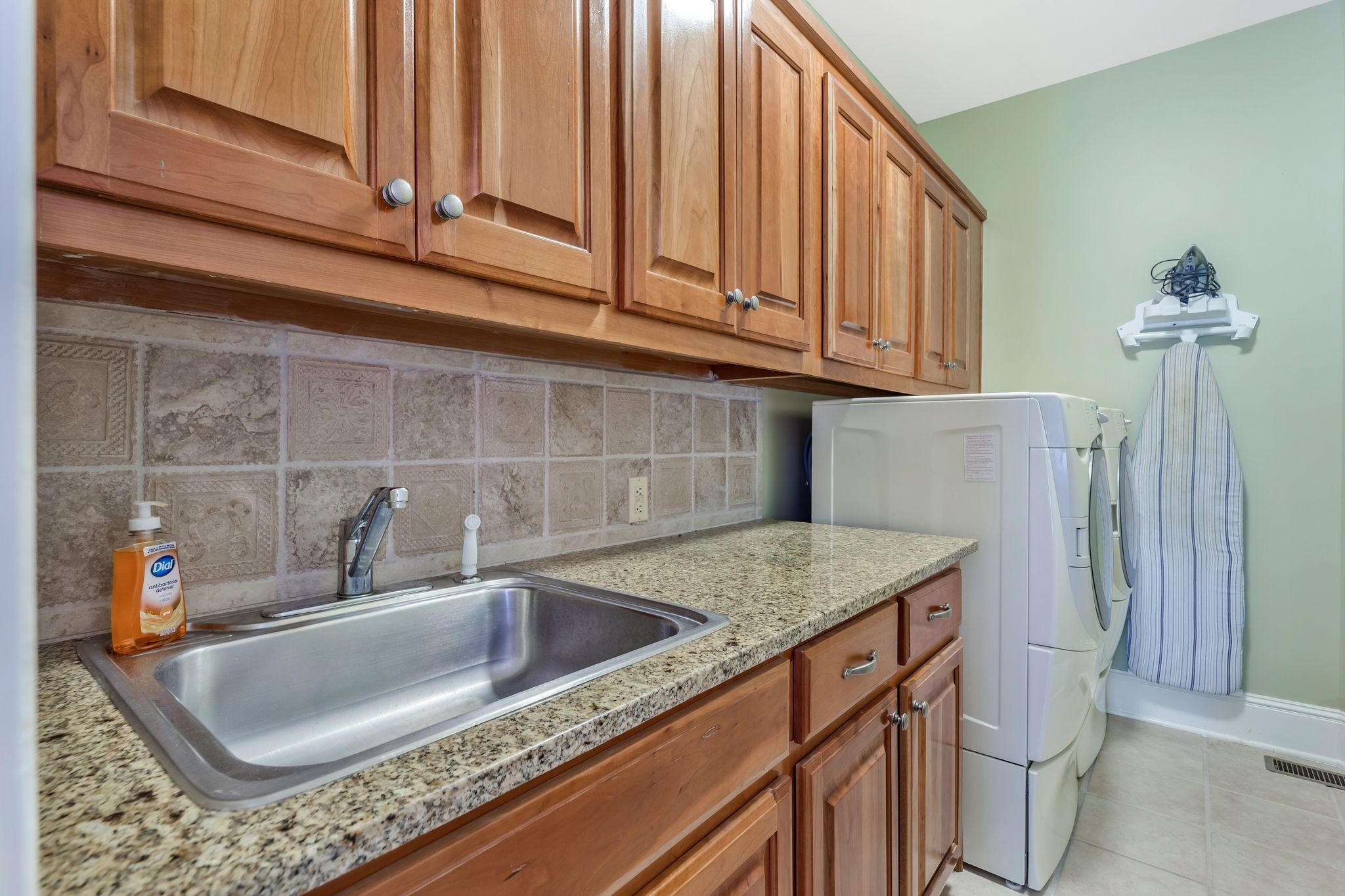 1036 Reed Hollow Road Readyville, TN 37149 - Photo 57 of 90 a kitchen with a sink cabinets and utility