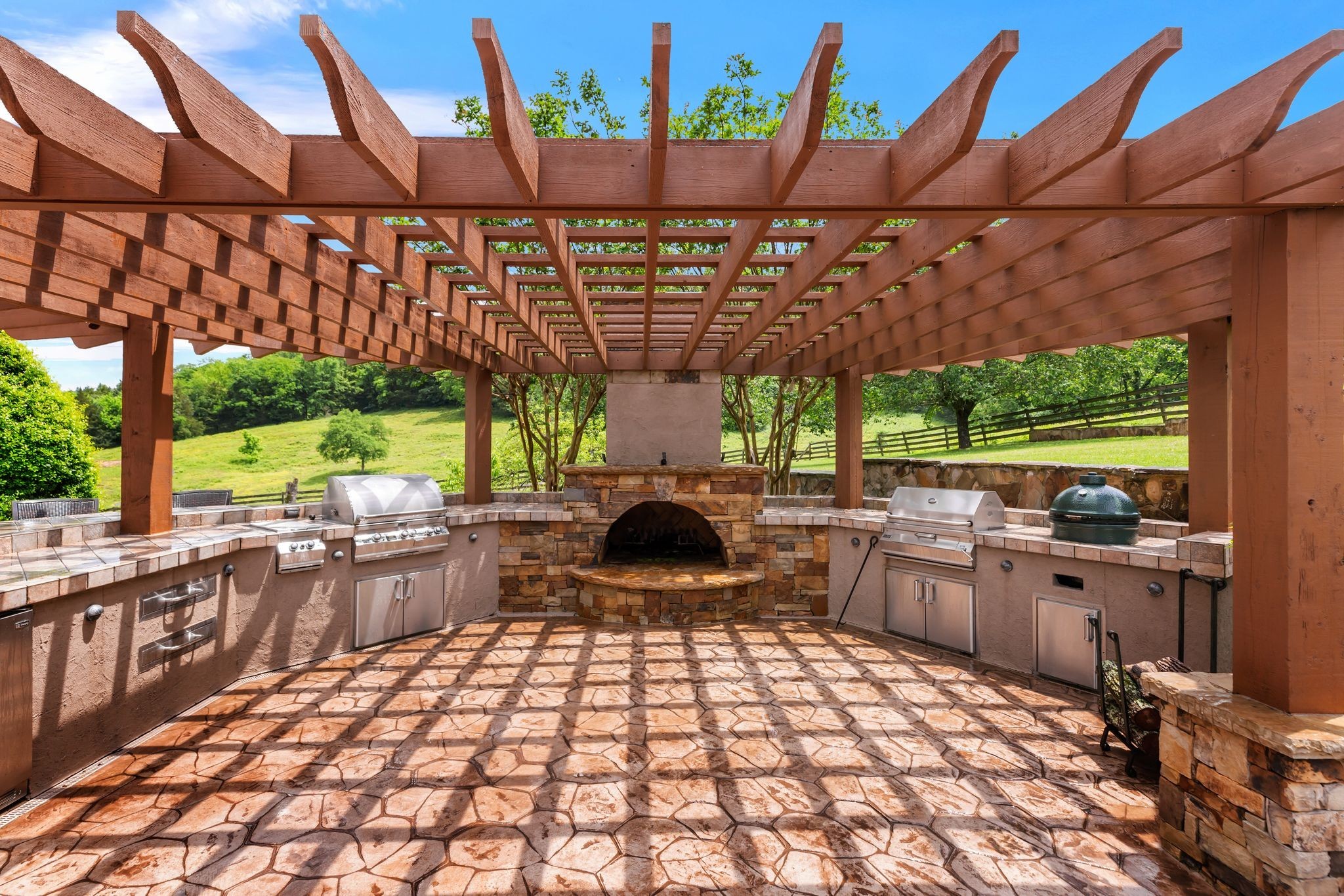 1036 Reed Hollow Road Readyville, TN 37149 - Photo 81 of 90 a view of a patio with a dining table and chairs