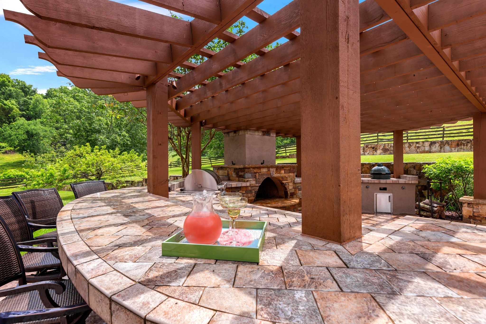 1036 Reed Hollow Road Readyville, TN 37149 - Photo 83 of 90 a view of a patio with table and chairs potted plants with floor to ceiling window and potted plants