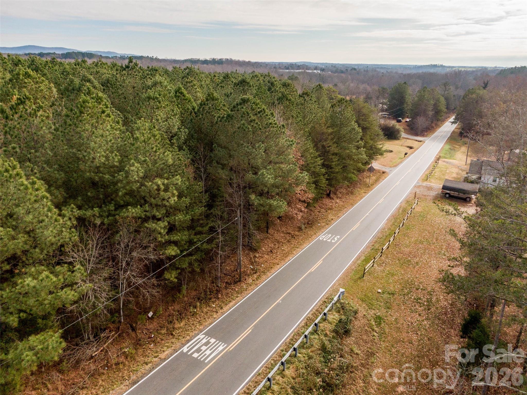 0 Hudlow Road, Unit 1A Forest City, NC 28043 - Photo 7 of 8 a view of a lake from a balcony