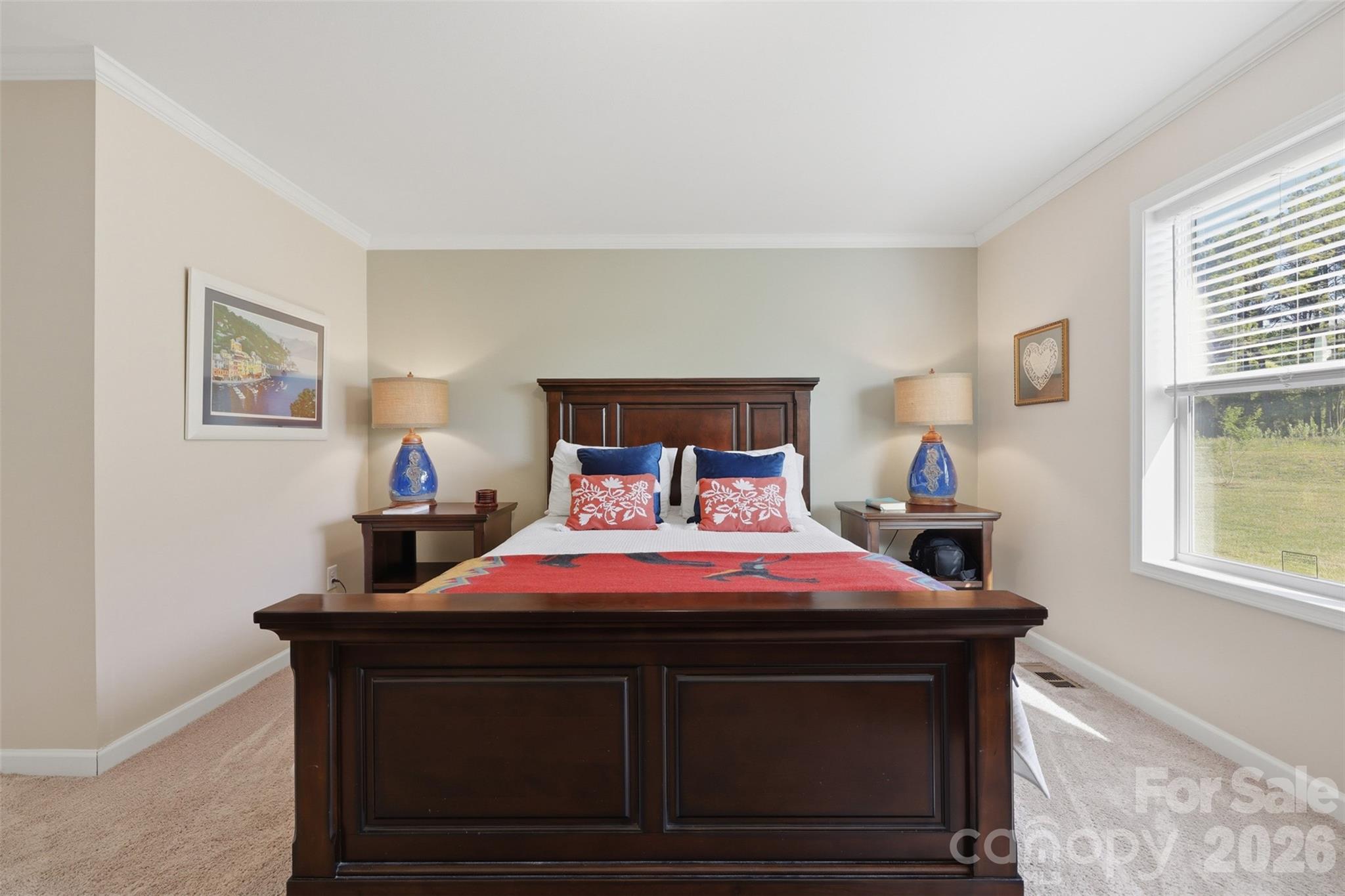 6591 George Hildebran School Road Hickory, NC 28602 - Photo 21 of 41 a bedroom with a bed and a window