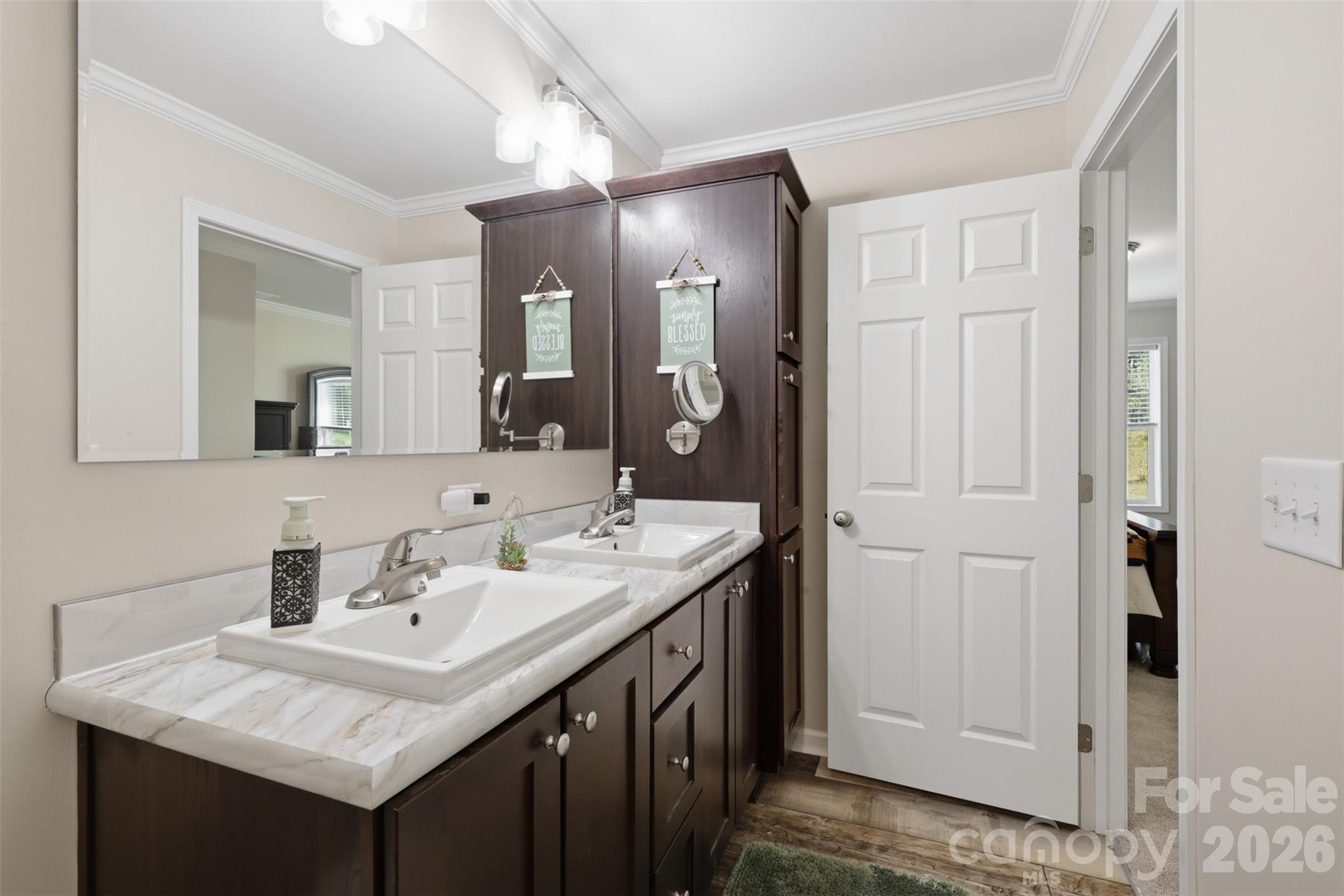 6591 George Hildebran School Road Hickory, NC 28602 - Photo 24 of 41 a bathroom with a sink and a mirror