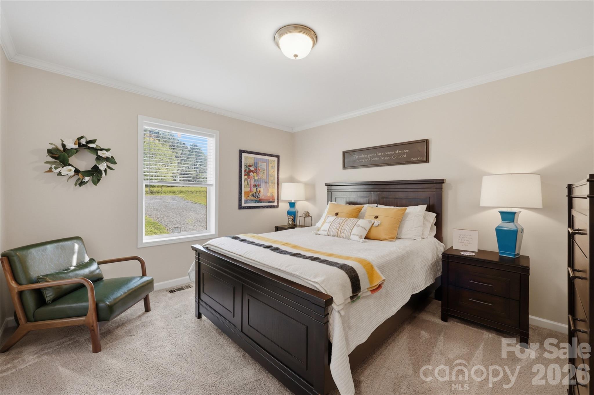 6591 George Hildebran School Road Hickory, NC 28602 - Photo 25 of 41 a bedroom with a bed and a window