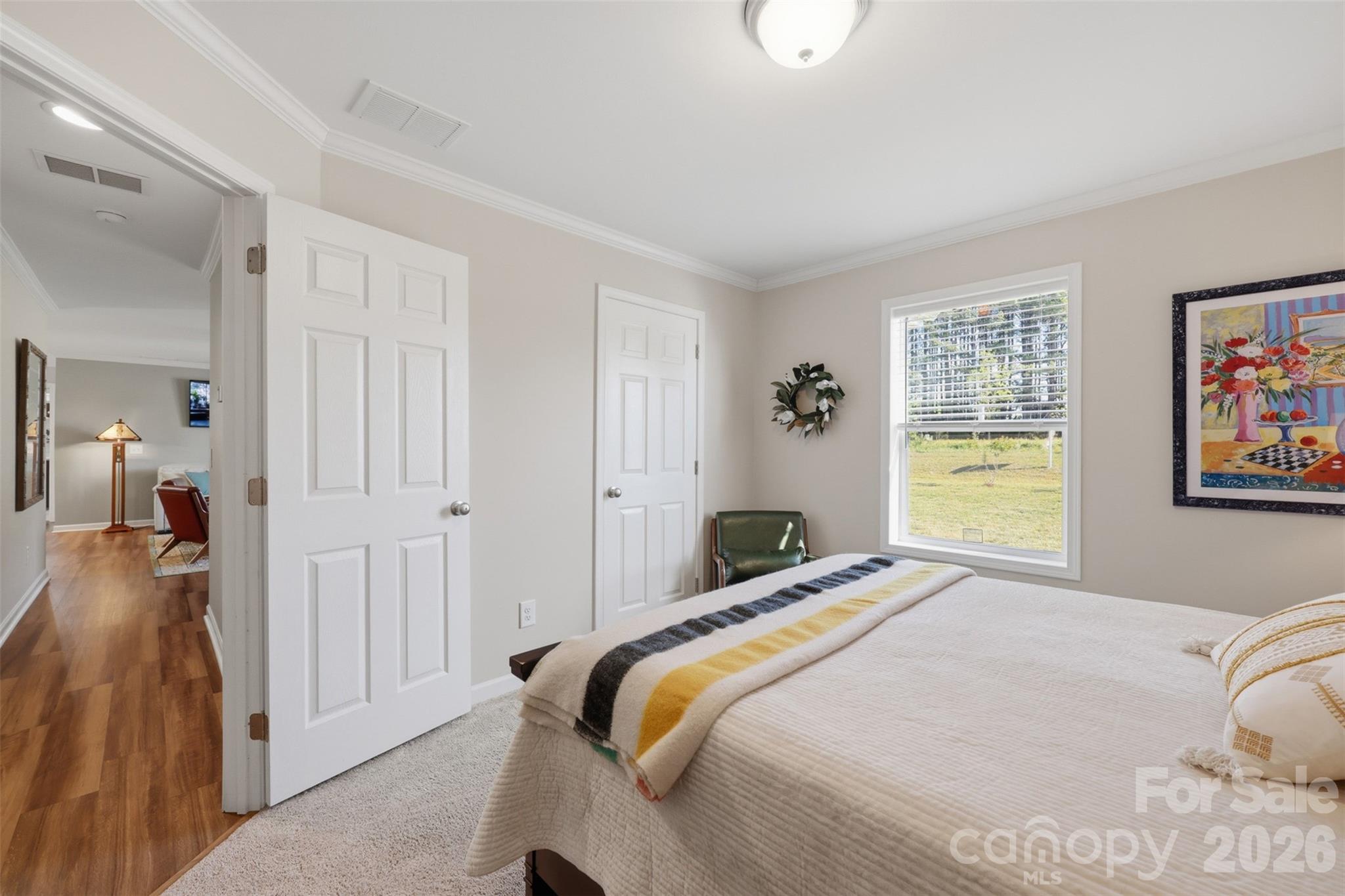6591 George Hildebran School Road Hickory, NC 28602 - Photo 27 of 41 a bedroom with a bed and a window