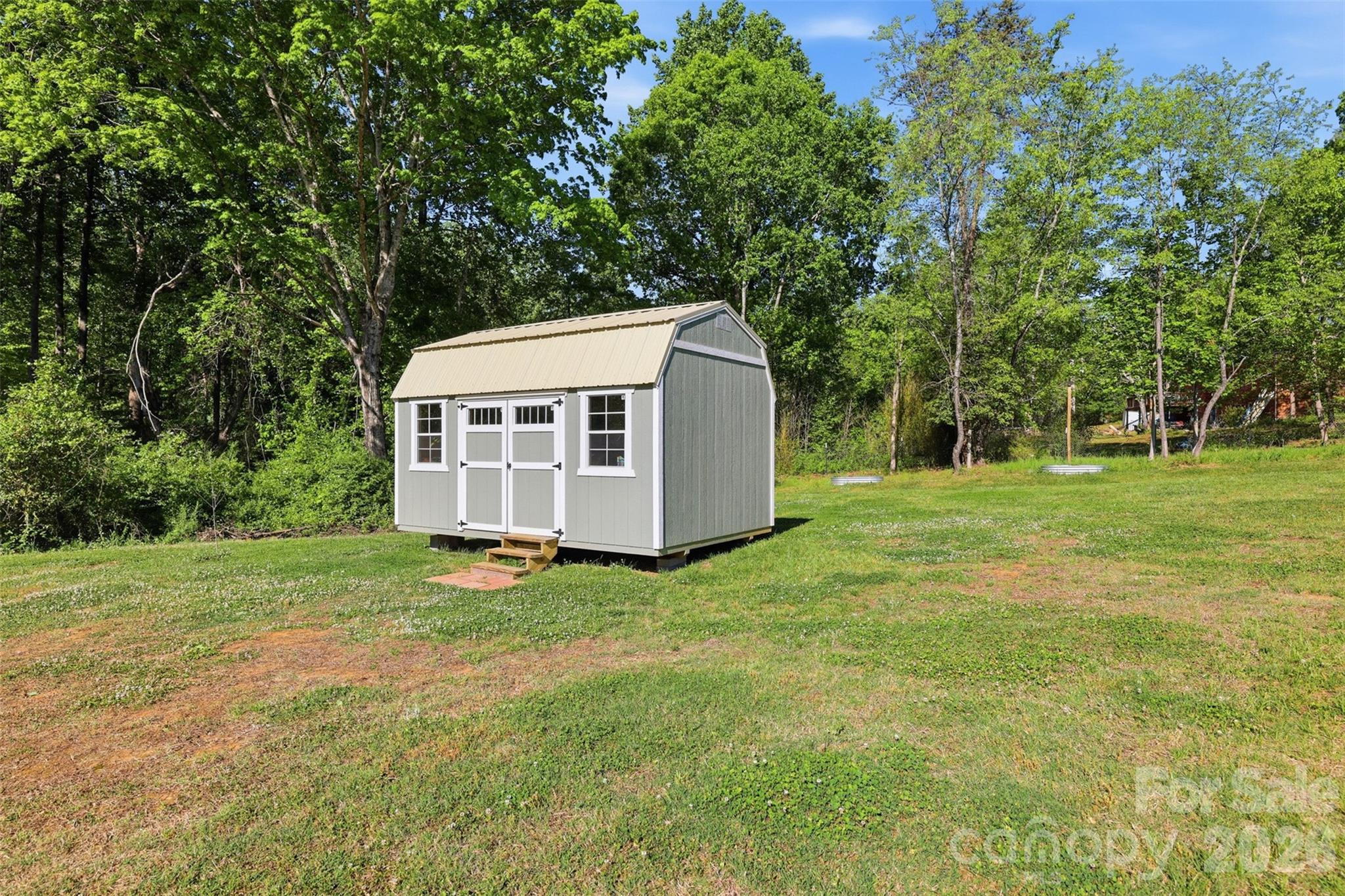 6591 George Hildebran School Road Hickory, NC 28602 - Photo 38 of 41 a view of a house with backyard