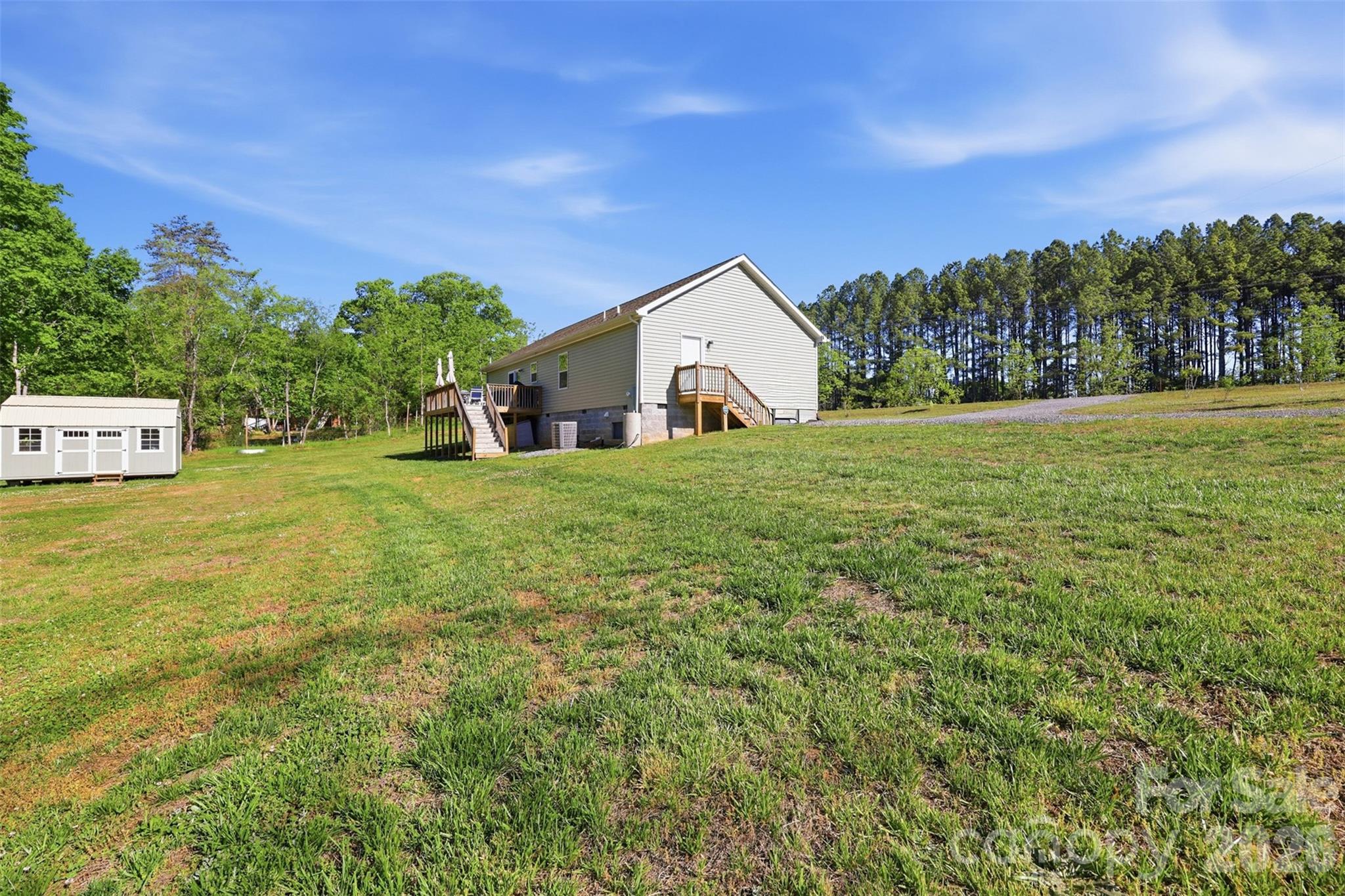 6591 George Hildebran School Road Hickory, NC 28602 - Photo 40 of 41 a house view with a garden space