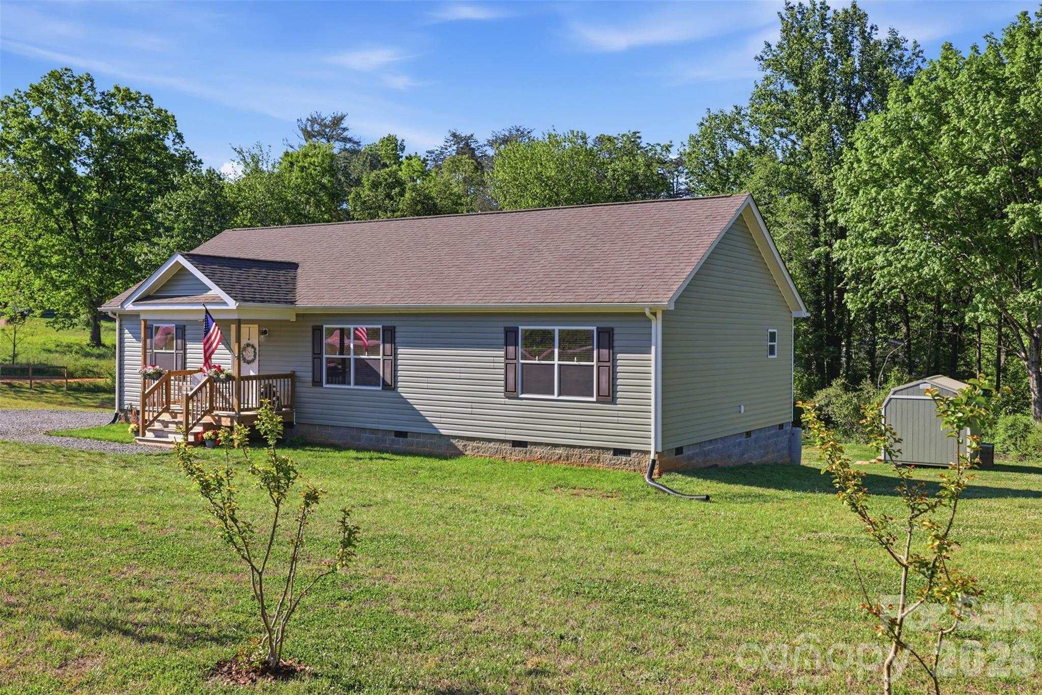 6591 George Hildebran School Road Hickory, NC 28602 - Photo 5 of 41 a aerial view of a house with yard and a tree
