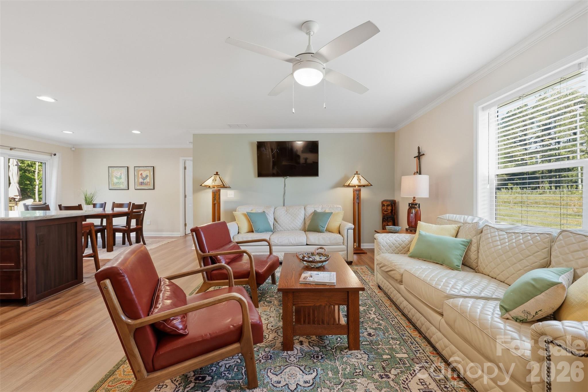 6591 George Hildebran School Road Hickory, NC 28602 - Photo 9 of 41 a living room with furniture and a flat screen tv