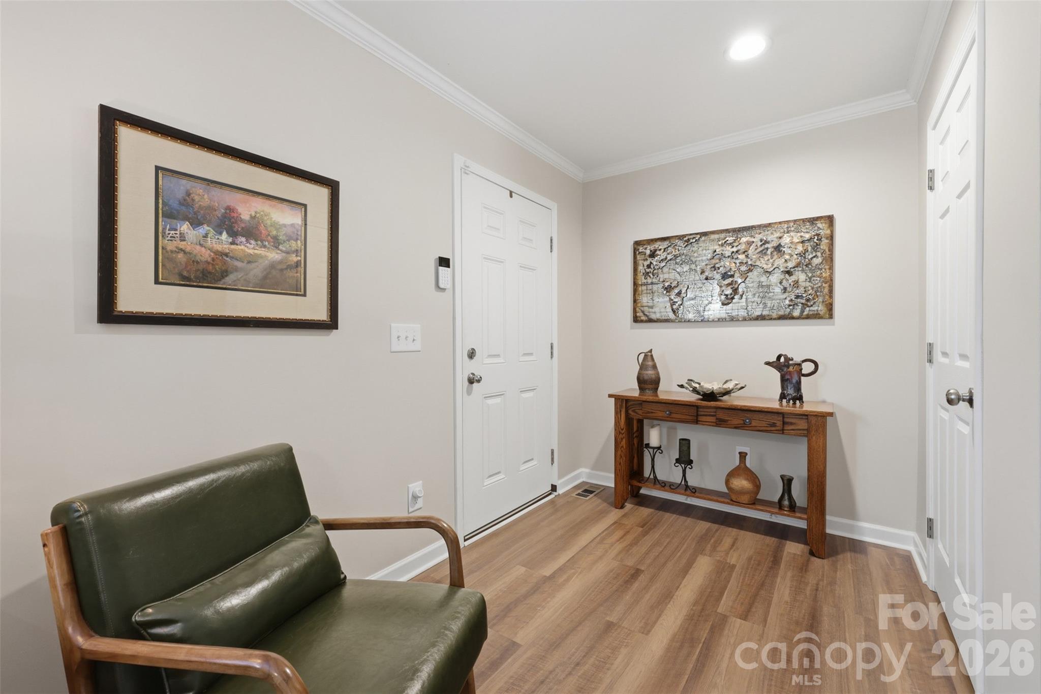 6591 George Hildebran School Road Hickory, NC 28602 - Photo 10 of 41 a living room with furniture and a flat screen tv