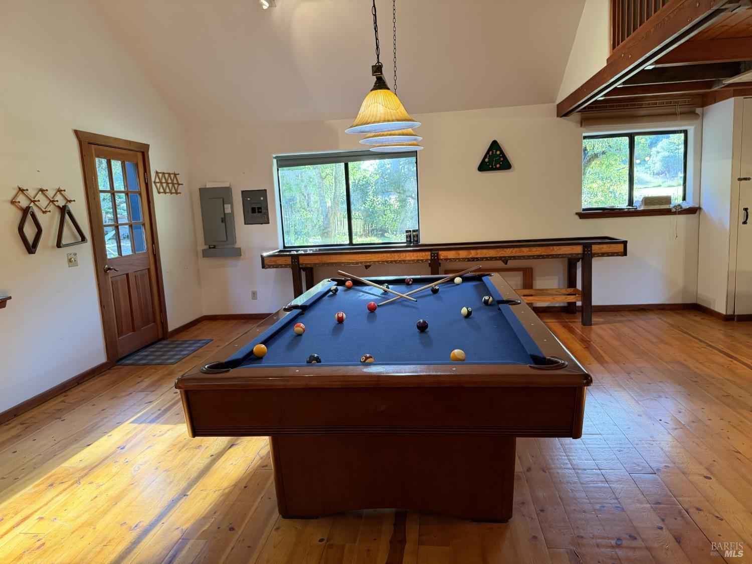 31397 Seaview Road Cazadero, CA 95421 - Photo 46 of 47 a room with wooden floor pool table and windows