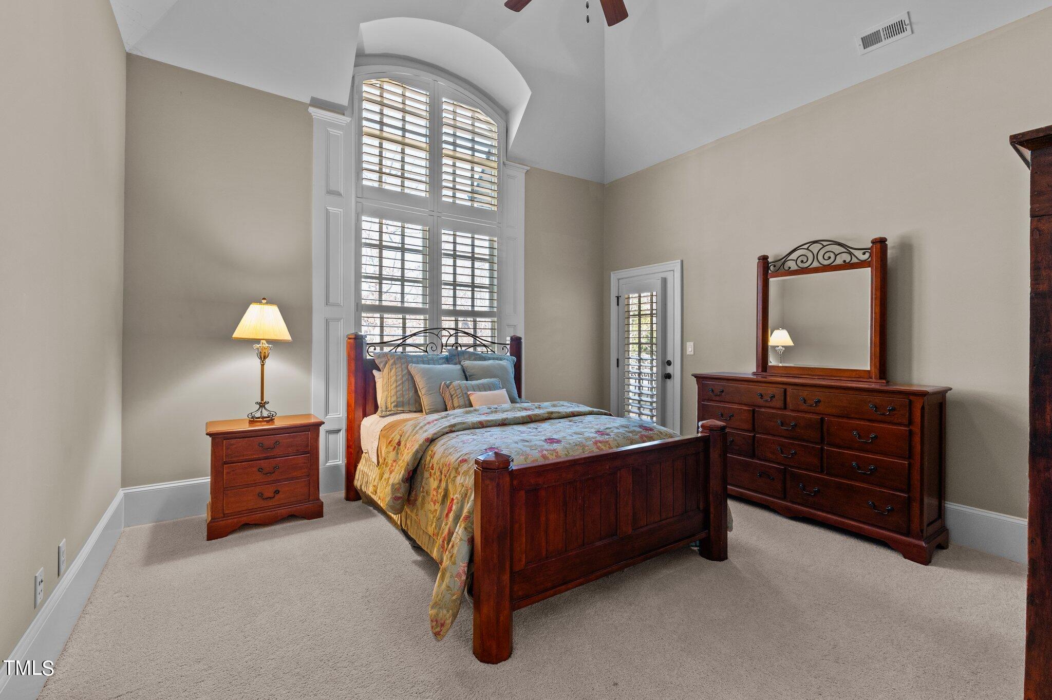2108 Cadenza Lane Raleigh, NC 27614 - Photo 28 of 43 Gorgeous high ceilings with large window. This bedroom has an en suite bathroom