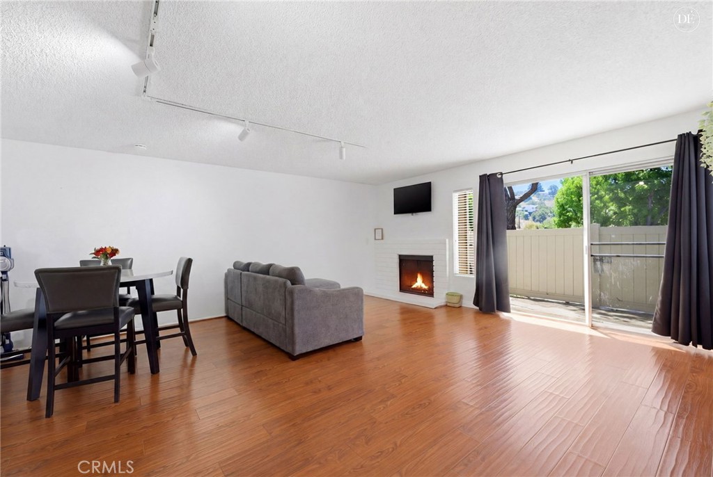23721 Highland Valley Road Diamond Bar, CA 91765 - Photo 9 of 60 Digitally altered with glowing fireplace
