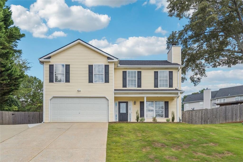 308 Ryan Trail Dallas, GA 30157 - Photo 1 of 1 a front view of a house with a yard