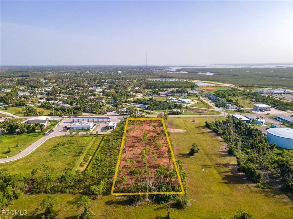 5401 Pine Island Road Bokeelia, FL 33922 - Photo 12 of 15 an aerial view of residential houses with outdoor space