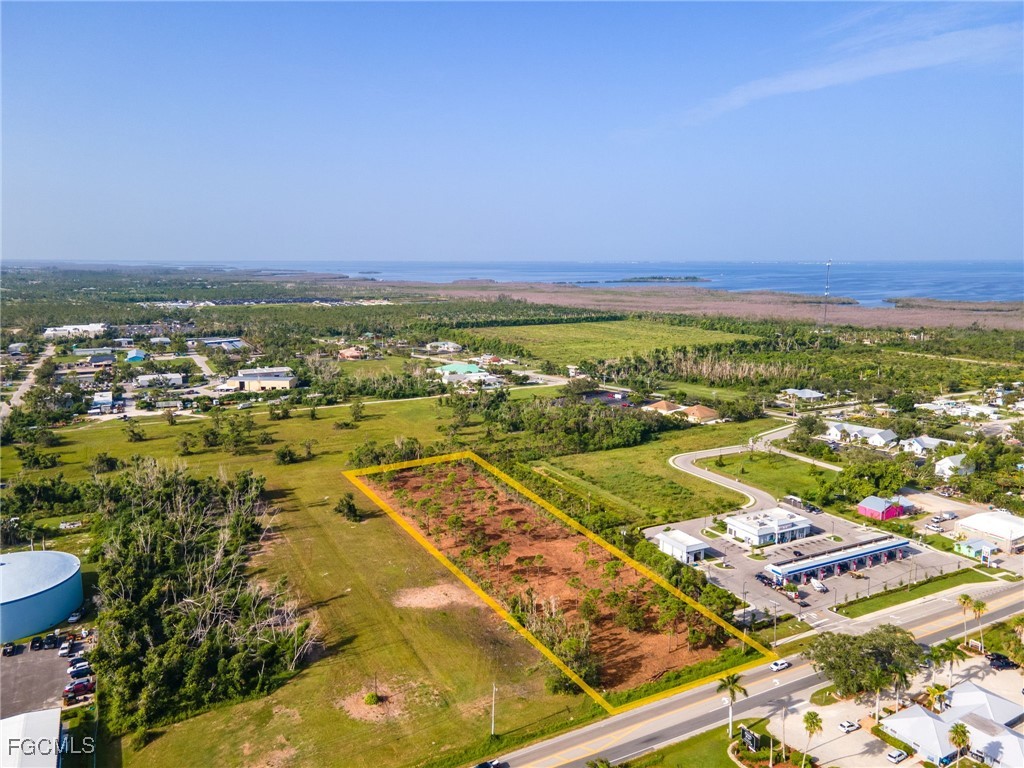 5401 Pine Island Road Bokeelia, FL 33922 - Photo 7 of 15 an aerial view of residential houses with outdoor space