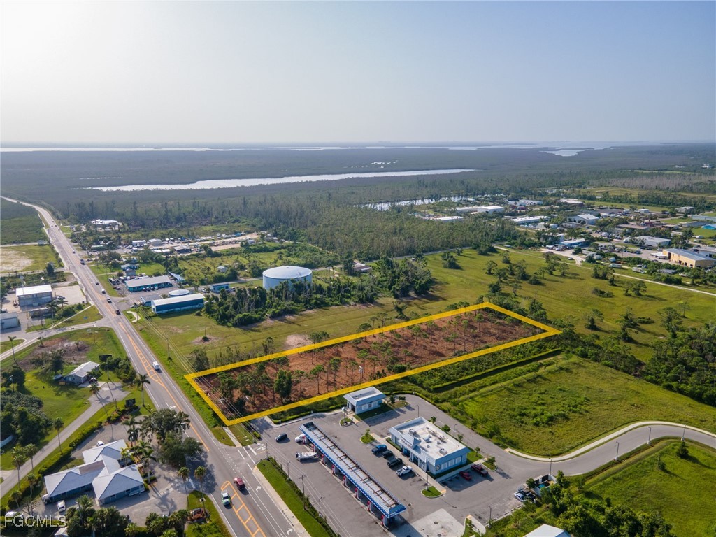 5401 Pine Island Road Bokeelia, FL 33922 - Photo 10 of 15 an aerial view of residential houses with outdoor space