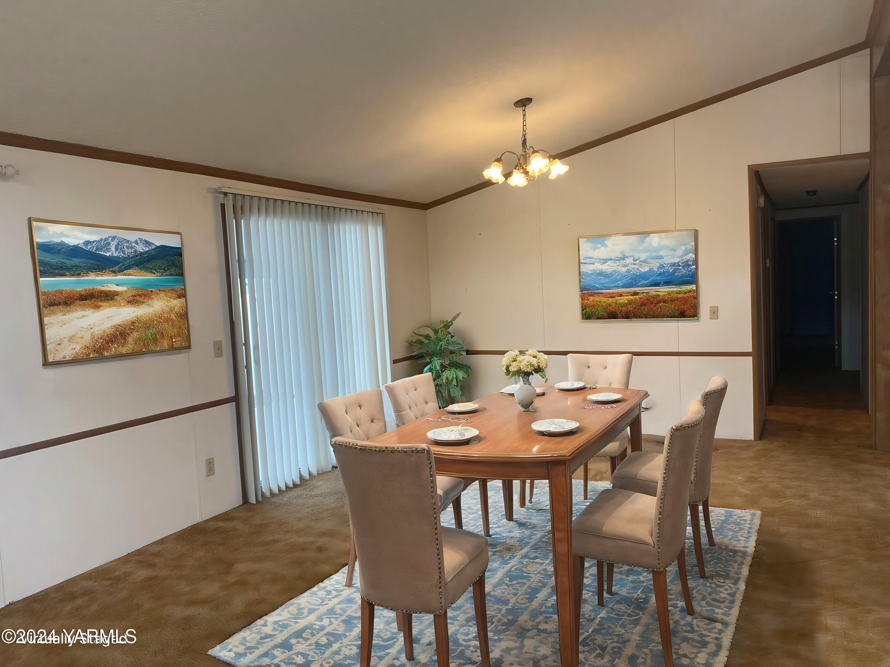 3701 Gun Club Road, Unit 49 Yakima, WA 98901 - Photo 6 of 14 a view of a dining room with furniture and wooden floor